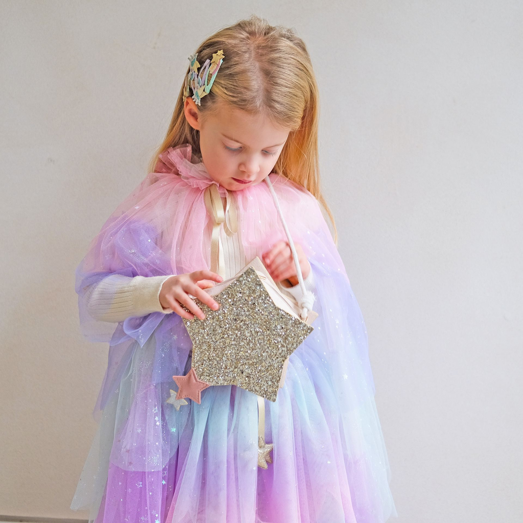 123102-59 SUPER SPARKLE STAR BAG, 182004-23 MY LITTLE UNICORN CLIC CLACS & 185005-47 SCALLOP PASTEL CAPE & 185006-47 SCALLOP PASTEL TUTU.webp
